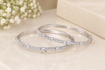 Elegant Diamond Bangles on Cream Marble