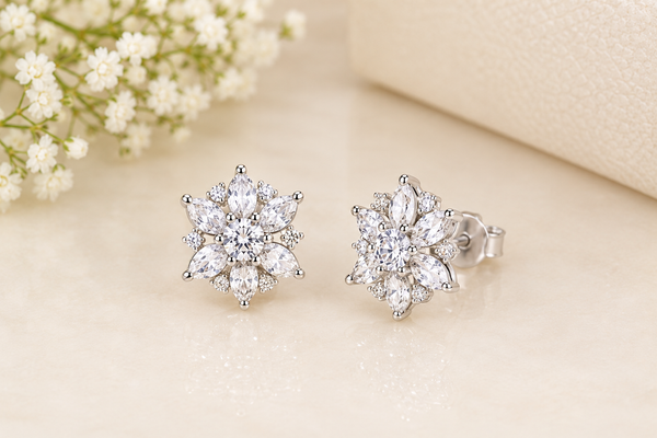 Floral Diamond Stud Earrings on Cream Surface
